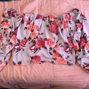 ruffled purple off the shoulder shirt